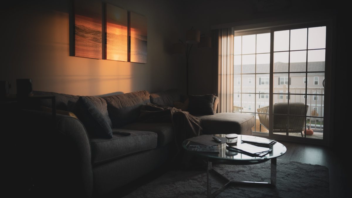 Empty couch after a death cleanup