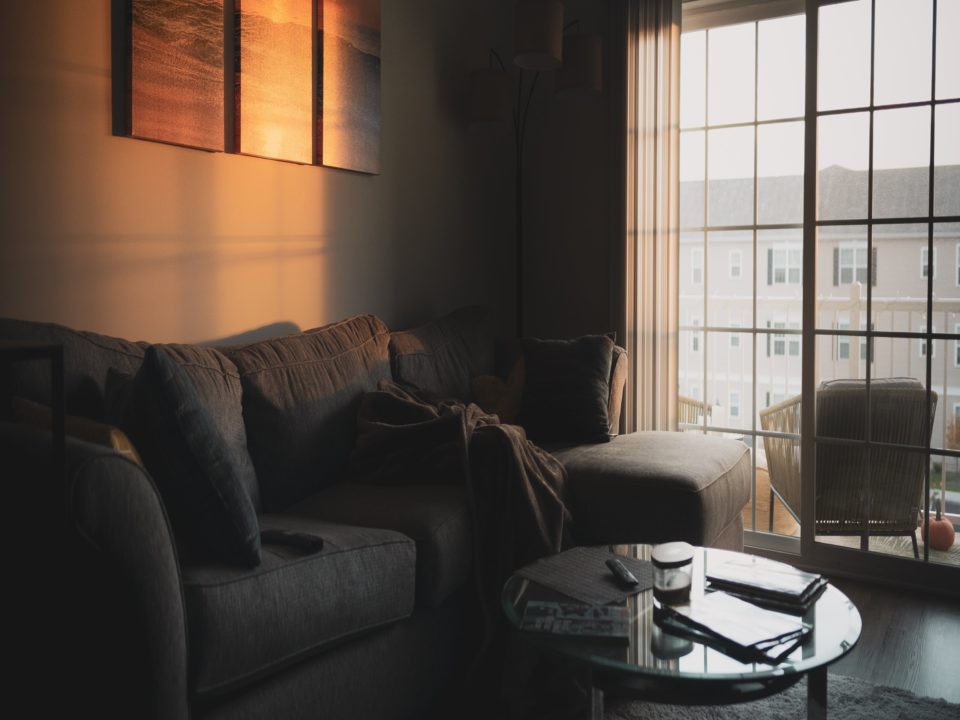 Empty couch after a death cleanup