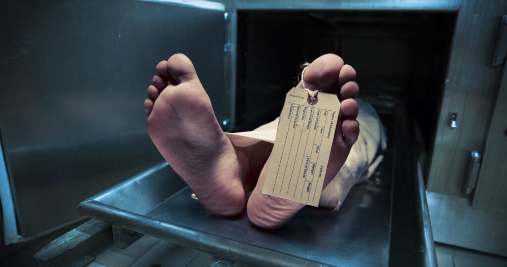 Toe tag on decomposing body