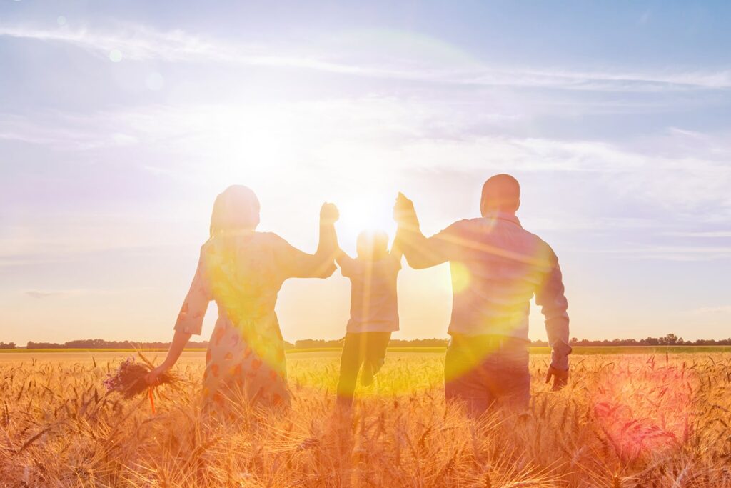 Family in a sunny field