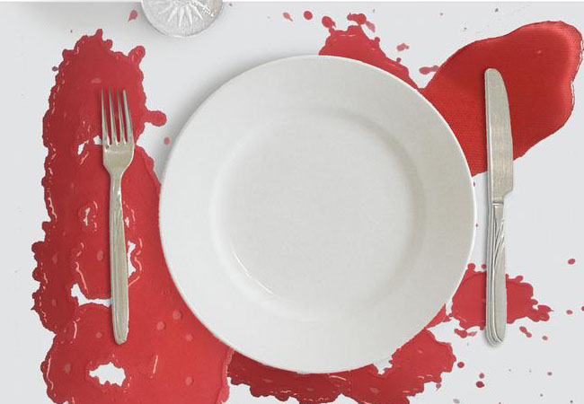 Color changing dinner mat, changes to blood splatters when wet