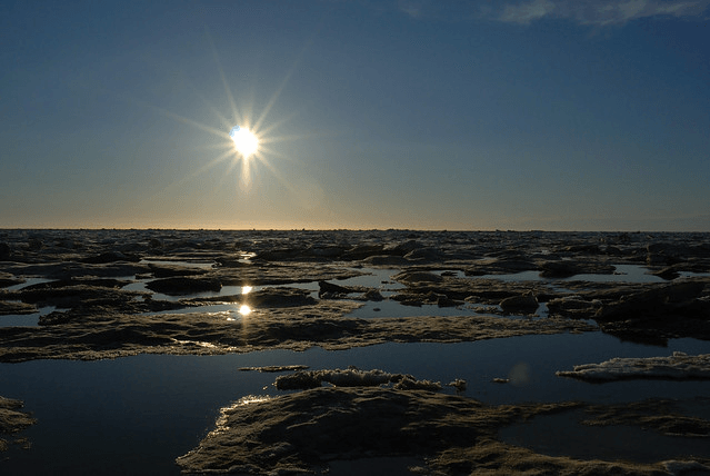 Photo of the low lying sun in Barrow, AK