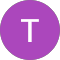 The letter T in a purple circle